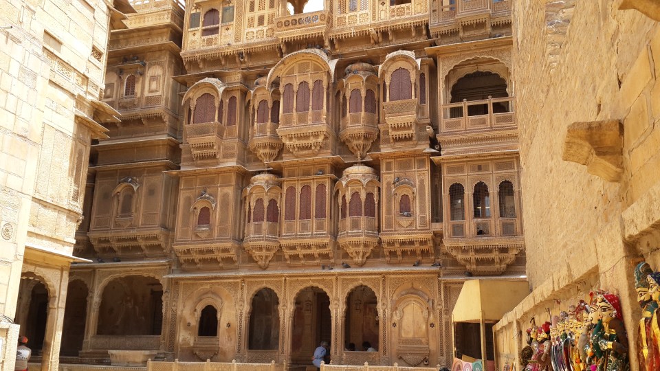 A jharoka is an overhanging or enclosed balcony as seen in this house facade