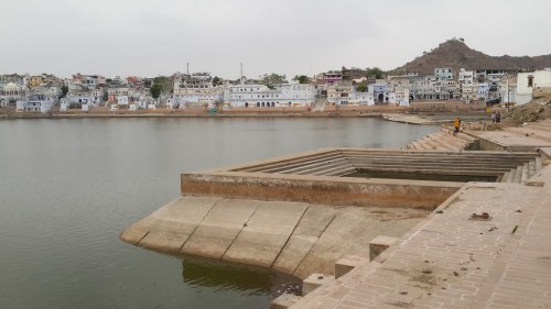 A small sign reminds visitors to remove their shoes while walking around...
