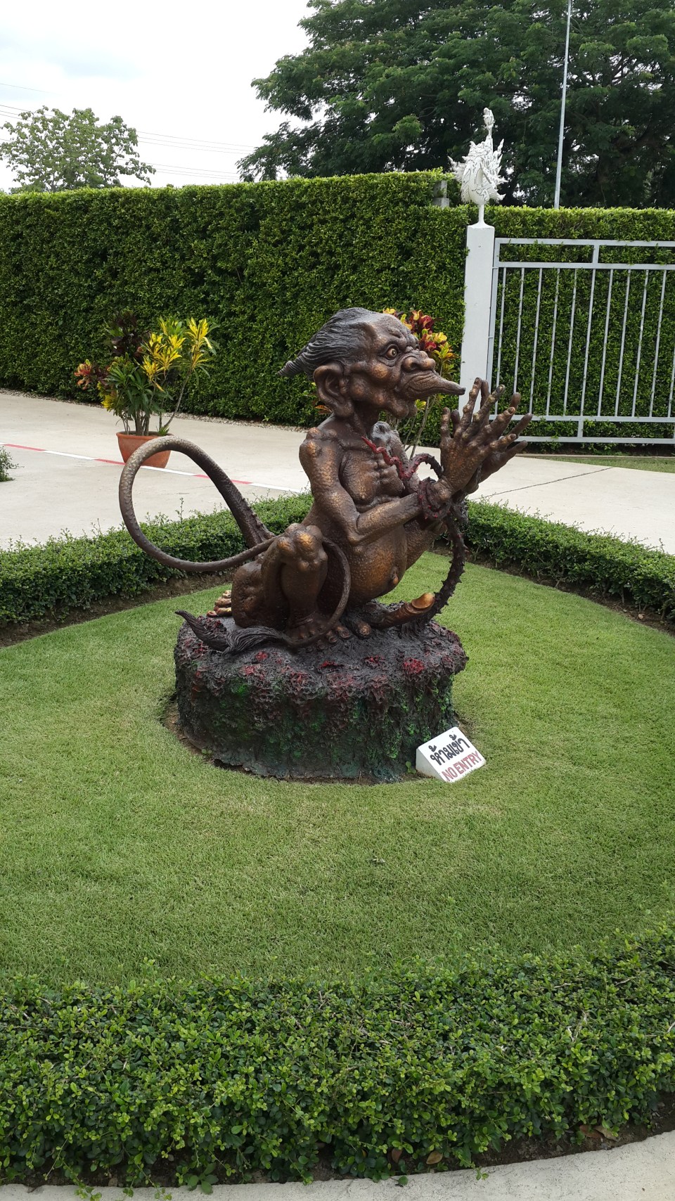 The hermaphrodite custodian of the toilet, front...